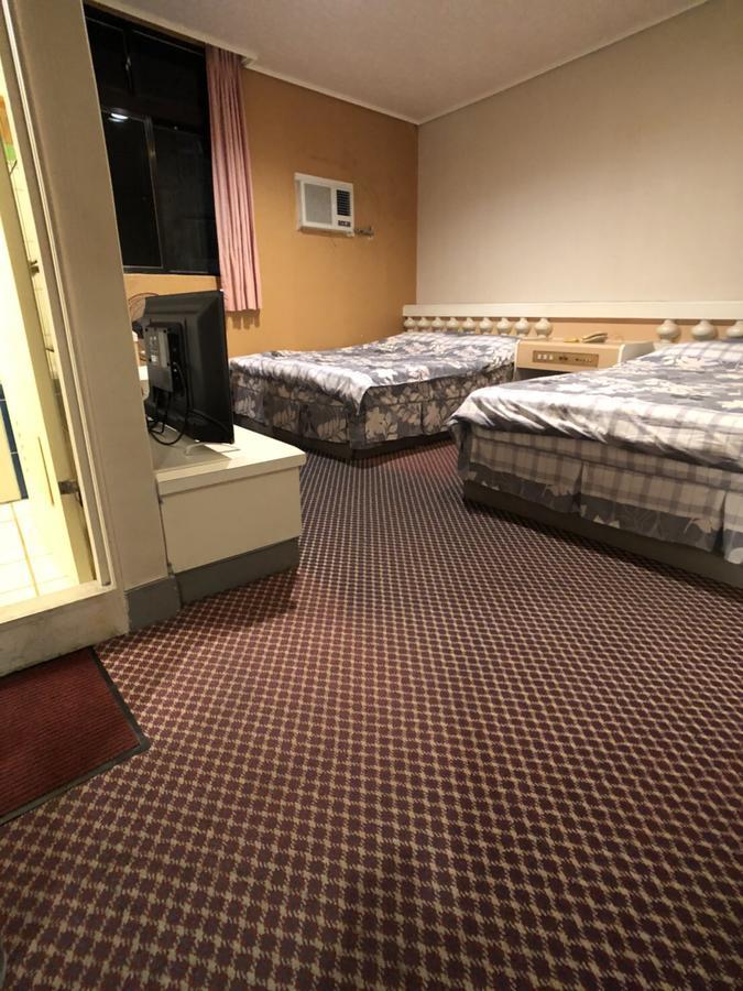 Ya Shi Deng Hotel Цзяосі Екстер'єр фото